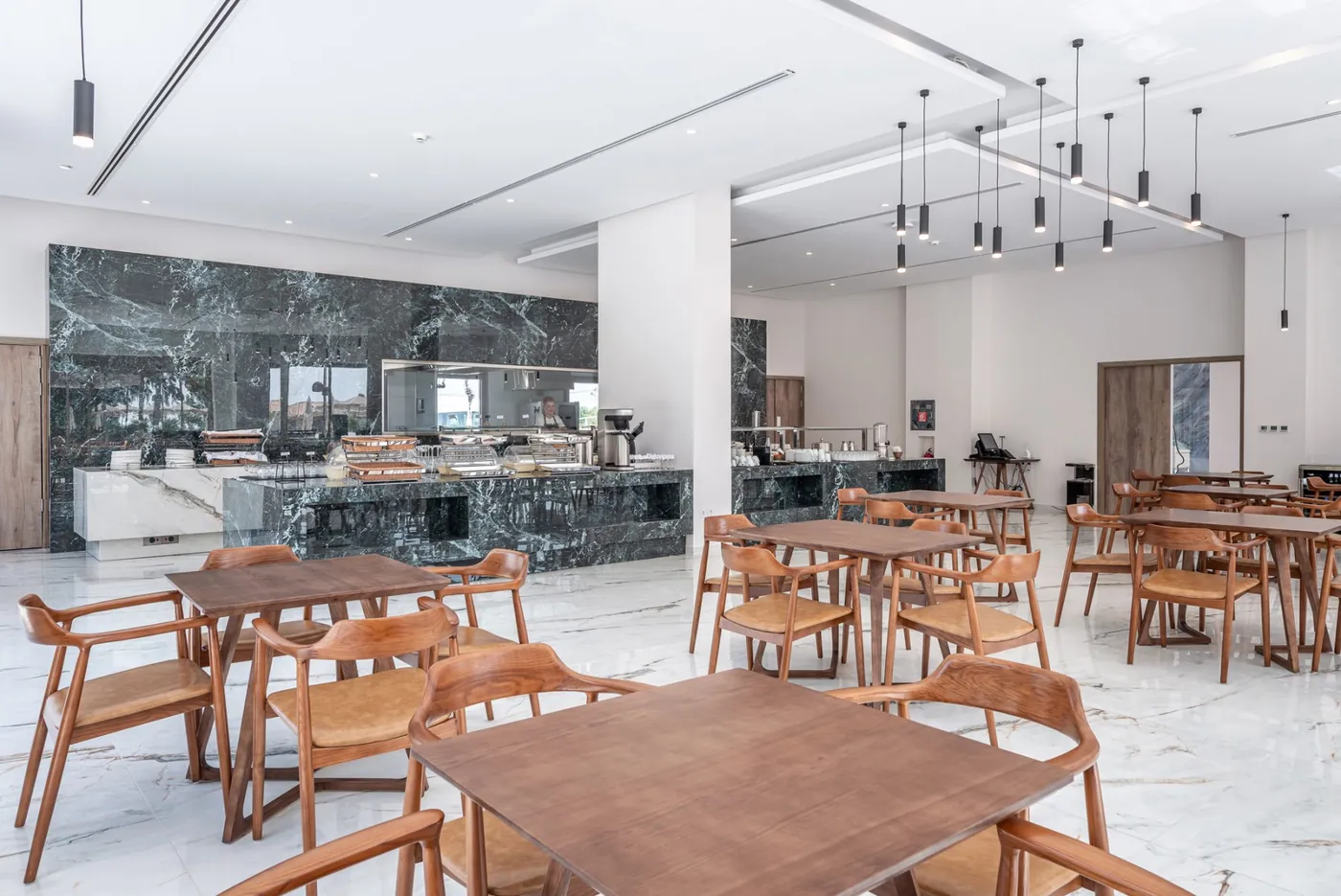 The breakfast room with its marble buffet and terrace windows